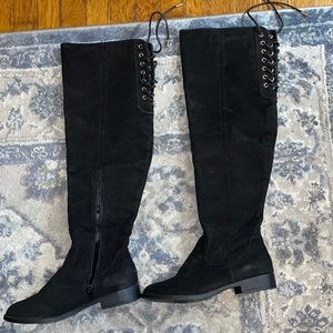 Tall black boots